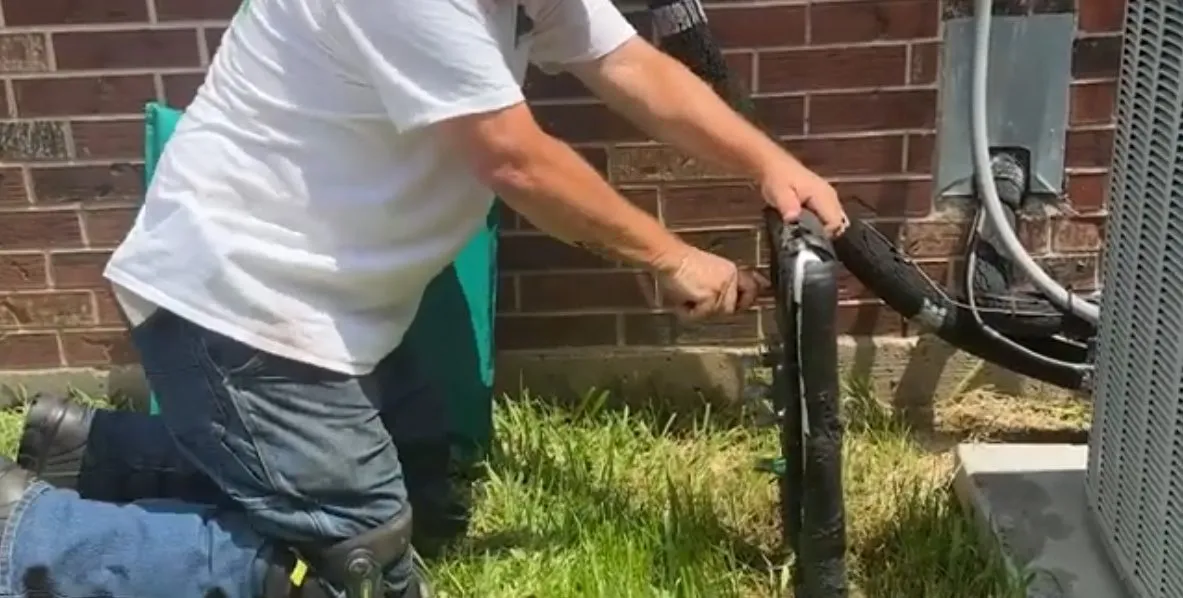 Plumber Opening Backflow Test Port for Emergency Plumber in Ennis, TX in Ennis, Texas.